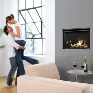 Kingsman Clean View 36-inch zero clearance direct vent gas fireplace with log set and porcelain liner
