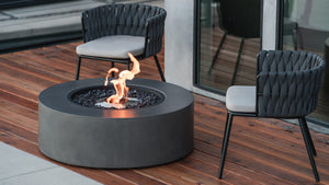 EcoSmart Fire Ark 40 on a timber deck with outdoor dining chairs
