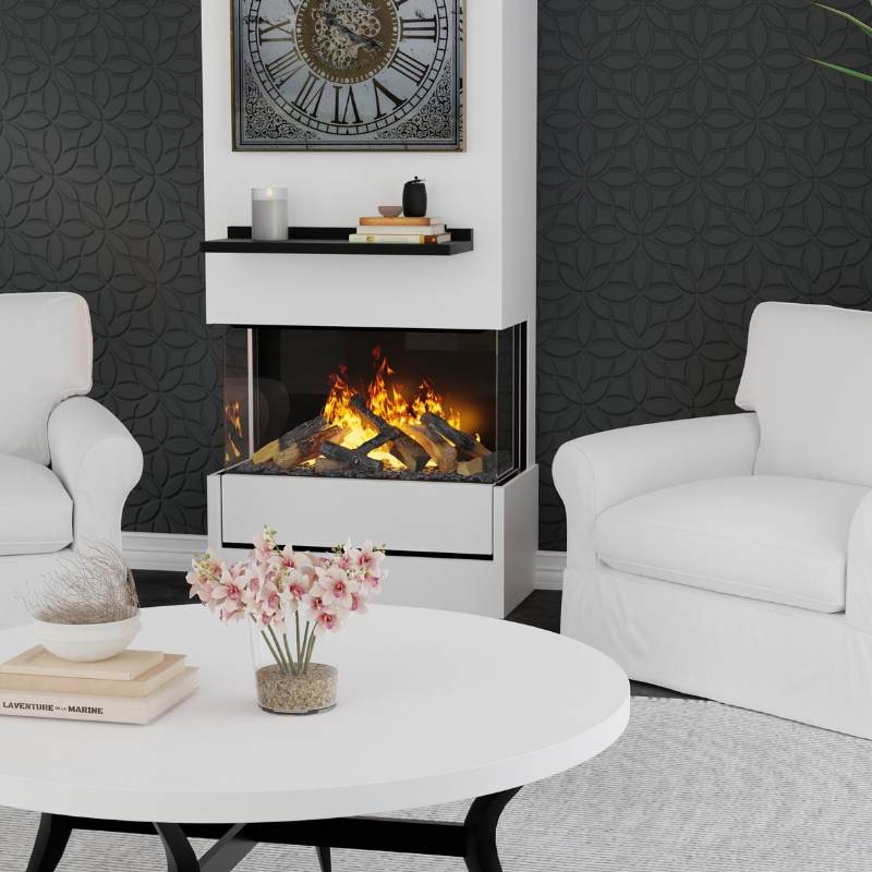 Dimplex Optimyst Aura 28-inch three-sided water vapour fireplace in a white surround against a dark patterned wall