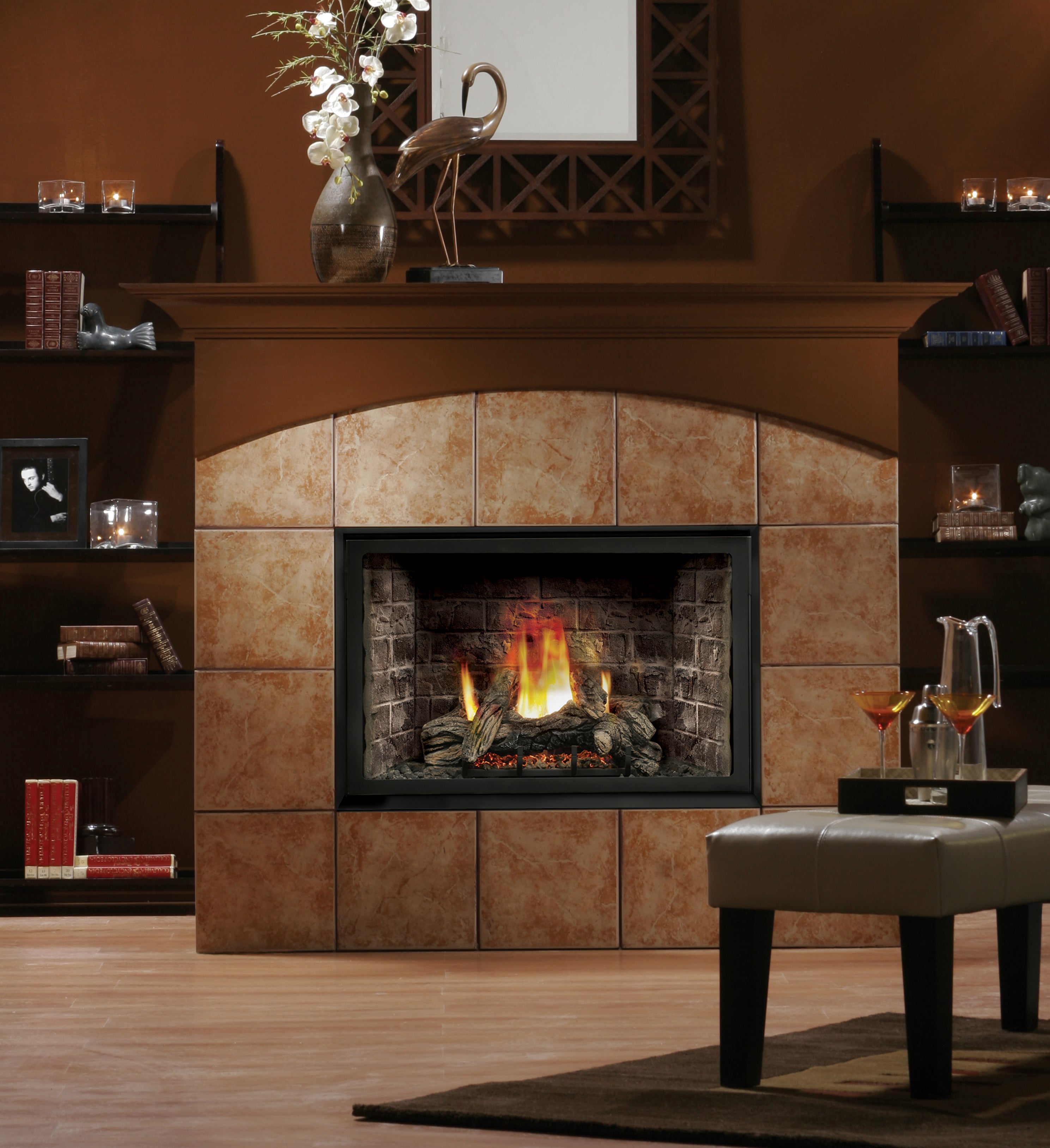 Kingsman Heritage 42-inch dual burner direct vent gas fireplace with Clean View Circulating front, brick liner and log set
