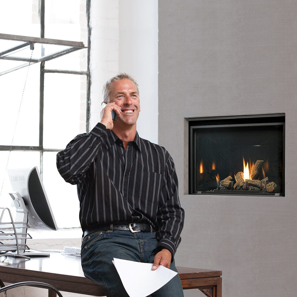 Kingsman Clean View 36-inch zero clearance direct vent gas fireplace with log set and porcelain liner